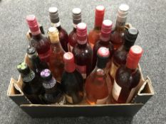 A box of twelve bottles of rose together with three bottles of beer