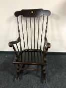 A stained beech rocking chair