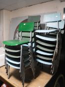 Nineteen 20th century plastic stacking children's school chairs