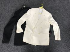 A rail of twentieth century and later clothing - Sheepskin coat, woollen over coat, Gent's jackets,