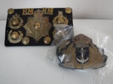 A collection of Royal Marine buttons together with naval patch
