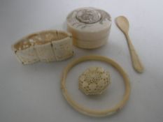 Five pieces of antique ivory - trinket box, spoon,