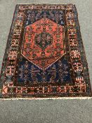 A Persian Malaya rug,