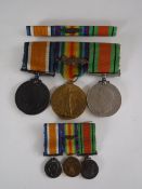 A First and Second World War trio comprising Victory Medal British War Medal and Defence Medal