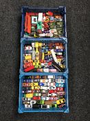 Three baskets of mid twentieth century and later die cast vehicles