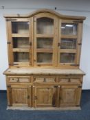 A rustic pine kitchen dresser CONDITION REPORT: Handles and hinges rusted somewhat.
