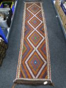 A Suzni kilim runner 283 cm x 64 cm