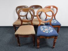 A set of three Victorian mahogany balloon back chairs together with a pair of Victorian balloon