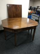 A George III mahogany octagonal extending dining table with leaf CONDITION REPORT: