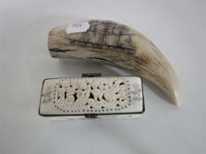A carved bone trinket box together with a contemporary scrimshaw style carving