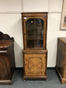 A good quality walnut display cabinet on stand, width 57 cm.