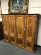 A late Victorian mahogany four door vestry cabinet, width 161 cm.