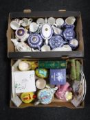 Two boxes containing boxed and unboxed Ringtons china including chintz teapots etc
