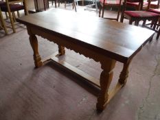 An oak refectory coffee table