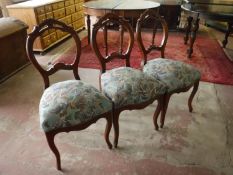 Three antique mahogany dining chairs