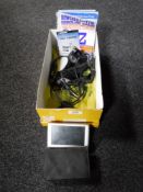A Garmin sat nav with leads and pouch together with blu-tooth telephone system