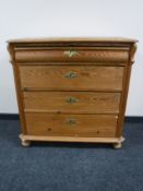 A continental pine four drawer chest