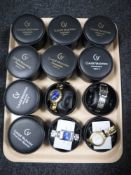 A tray containing twelve boxed Claude Valentini gent's wristwatches