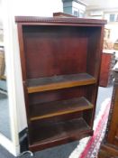 A set of mahogany open bookshelves