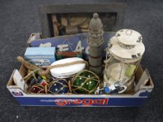 A wooden oar together with a box containing wooden ornaments and plaques relating to the sea side