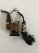 A pipe with silver mounts together with another pipe