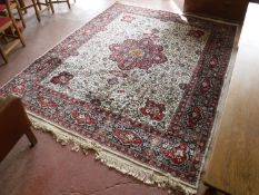 An Isfahan design carpet on cream ground