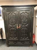 A 19th century Eastern hardwood double door cabinet,