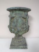 A bronze effect urn