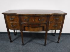 A Victorian mahogany shaped front sideboard