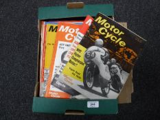 A box of vintage motorcycle magazines