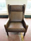 A mid 20th century Danish brown leather armchair