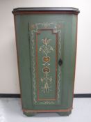 A 19th century painted corner cabinet