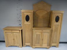 A continental oak sunk centre sideboard with matching side cabinet fitted a drawer