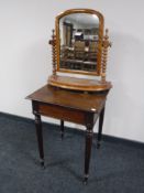 A Victorian mahogany occasional table on reeded legs together with a Victorian mahogany dressing