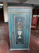 A painted sentry door cabinet