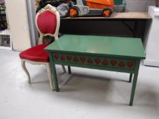 A painted coffee table and a dining chair