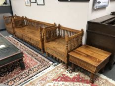 A good quality Eastern Sheesham wood four piece lounge suite comprising four seater bench,