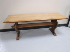 An oak refectory coffee table