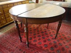 A pair of antique pine d-shaped tables
