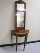 A late 19th century inlaid mahogany d-shaped hall table with mirror
