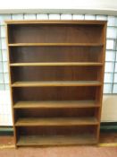 A set of mahogany open shelves