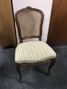 A continental bergere backed dining chair