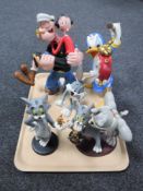 A tray of five contemporary figures, Donald Duck,
