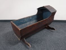 A Victorian pine rocking crib