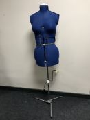 An adjustable dress maker's dummy