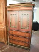 An early 20th century painted cocktail cabinet