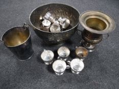 An early twentieth century embossed punch bowl with ladle and cups together with two plated wine