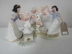 Two Lennox figures 'Dopey's Sweet Reward' and 'Dancing with Snow White'