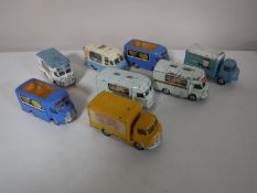 Eight Corgi 'Karrier' models; Hot Mobile Shop (X2), 411 Lucozade, 413 Mobile Butchers,