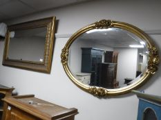 A contemporary gilt framed overmantel together with gilt framed bevelled edge mirror